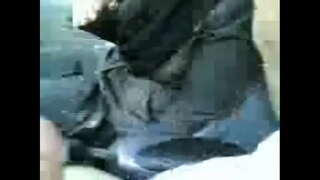 Арабская зьменіцца ў хіджабе